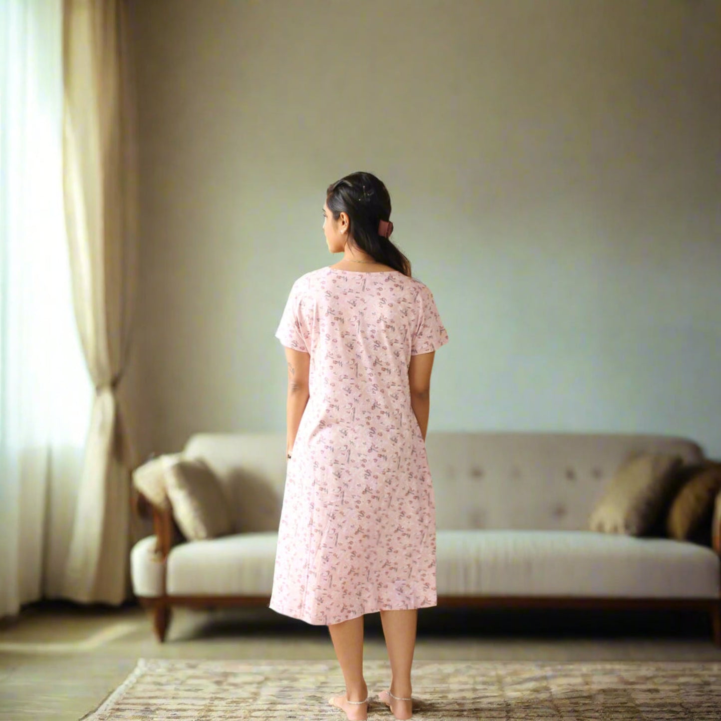 back side view of short nighty for women in light pink color