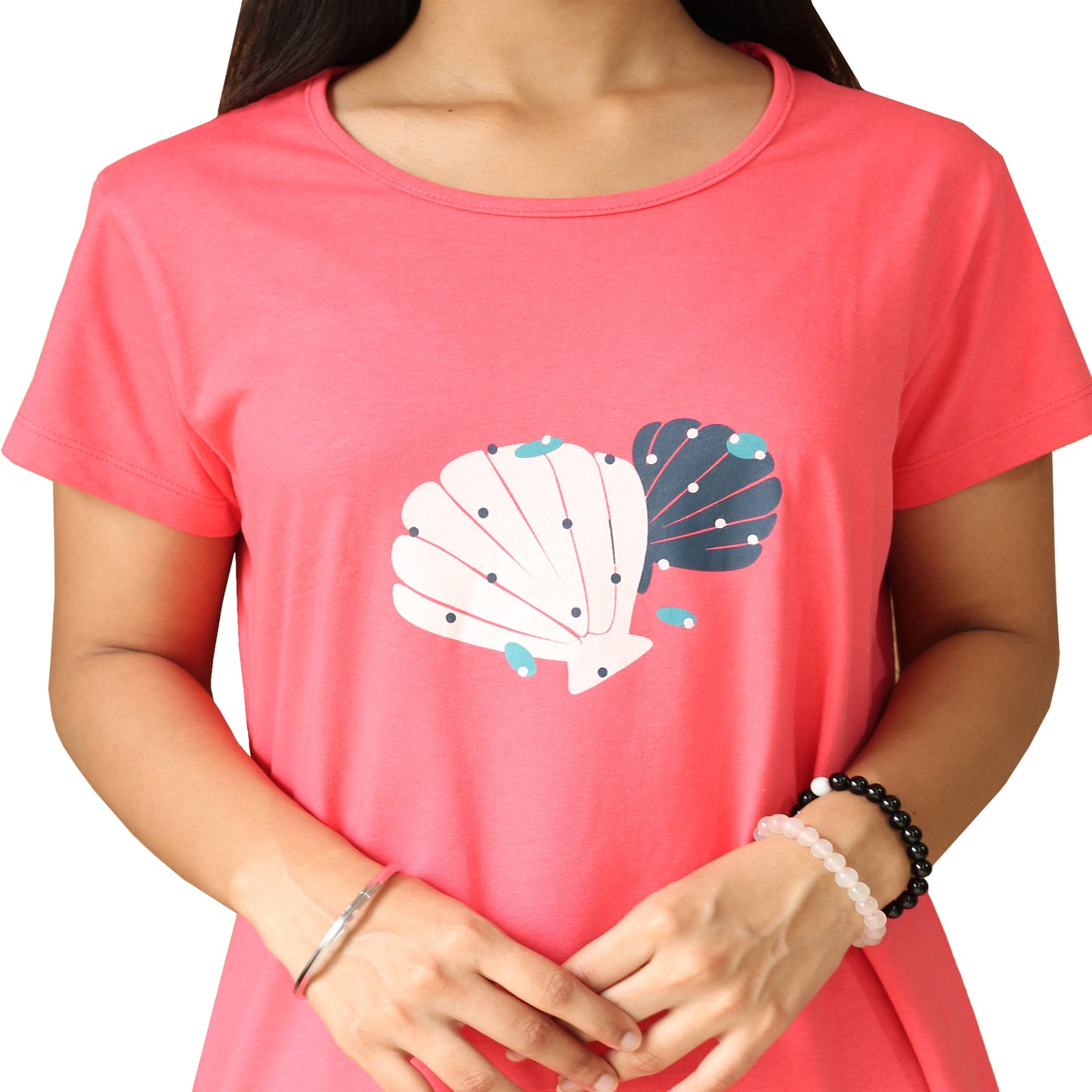 closeup view of chest print, floral design printed in chest area in white and blue color