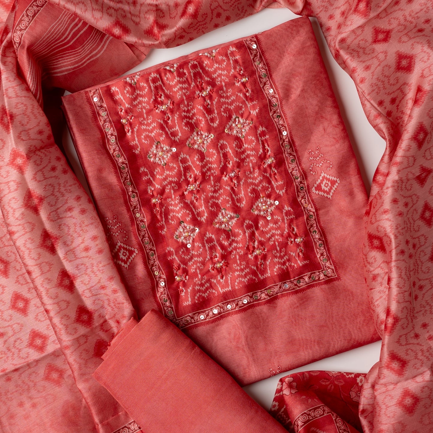 pink color silk unstitched salwar set with patola prints and stone work