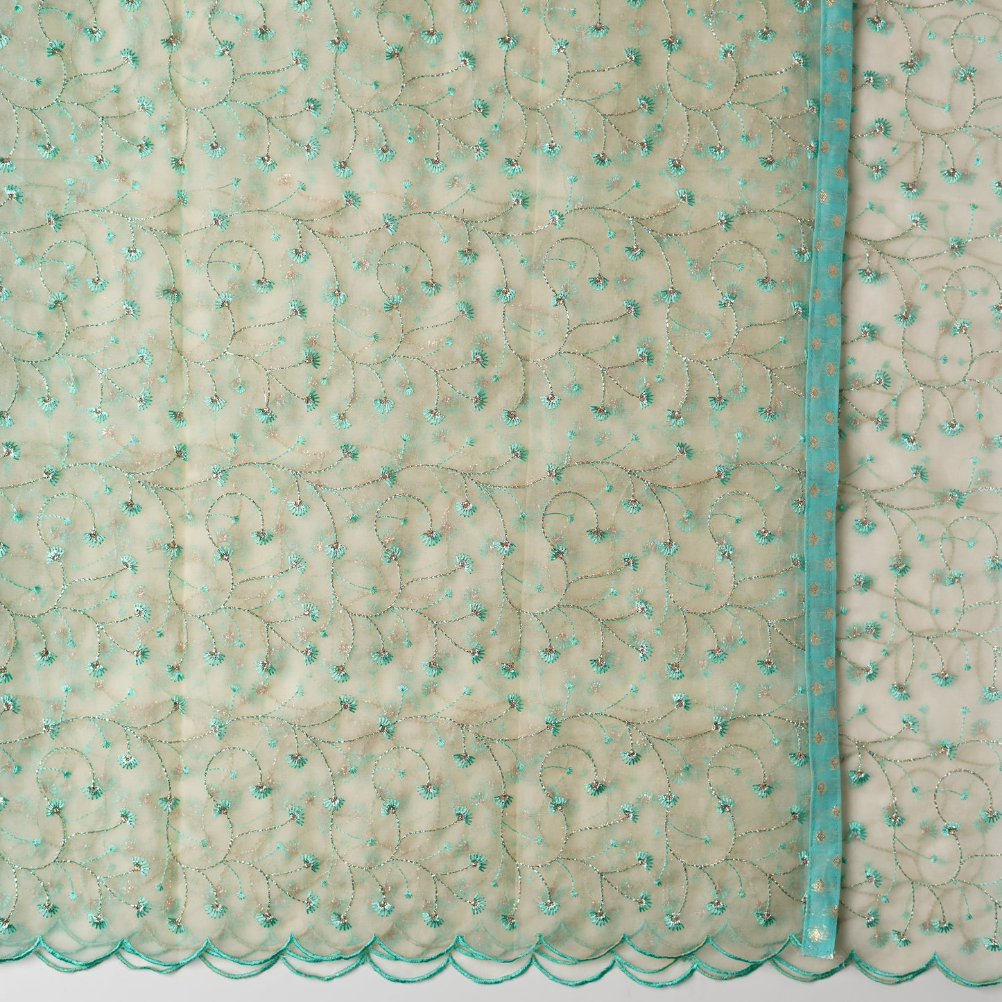 cream color silk dupatta with embroidery all over and cut work on the border