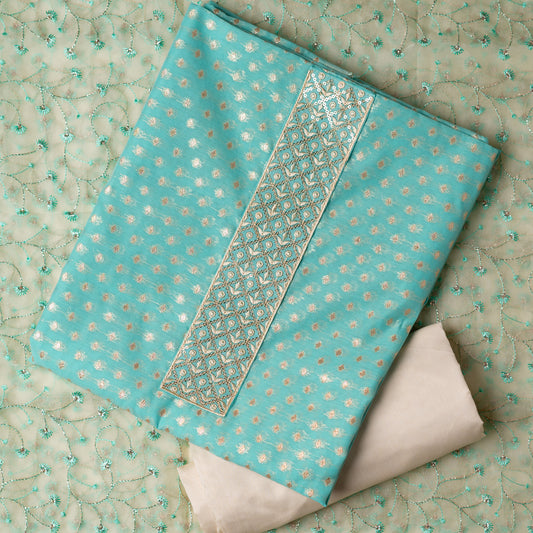 light blue color silk dress material with cream color silk bottom and silk dupatta