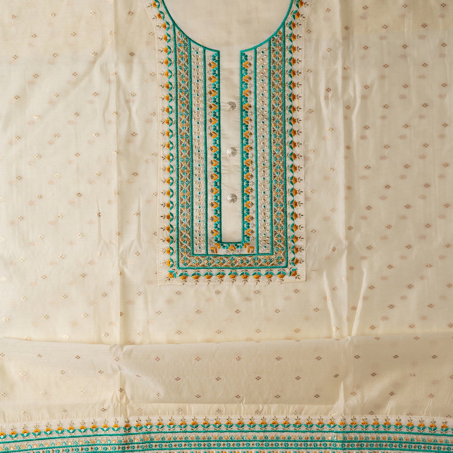 A unique design , perfect for your loved ones . Gift this beautifully embroidered chanderi silk unstitched salwar suit material. Top with embroidery work on neck line and golden thread jacquard small design weaving all over. The border of the dress is also embroidered elegantly.