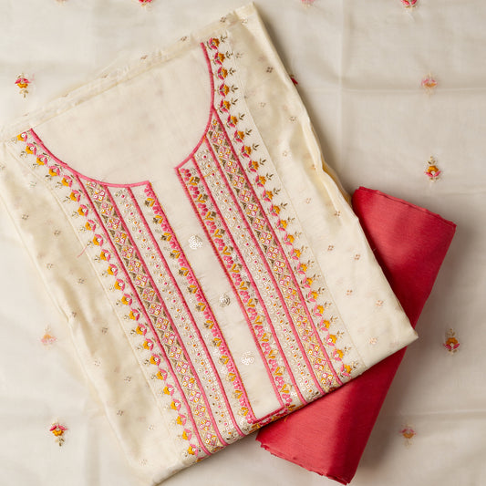 A unique design , perfect for your loved ones . Gift this beautifully embroidered chanderi silk unstitched salwar suit material. Top with embroidery work on neck line and golden thread jacquard small design weaving all over. The border of the dress is also embroidered elegantly. Matching cream color dupatta with embroidery work all over and on the borders. Peach color cotton silk bottom.