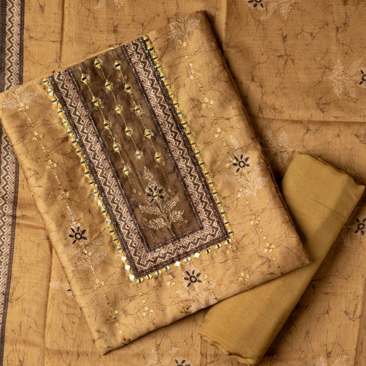 Chanderi silk dress material with print design, embroidery work, thread work and sequins work. It has zari and mirror work in neck area also. Silk dupatta with beautiful digital prints matching the top color. Cotton silk bottom same color as the top and dupatta.
