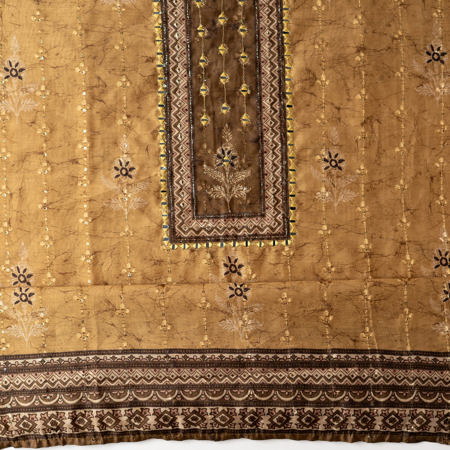 Chanderi silk dress material with print design, embroidery work, thread work and sequins work. It has zari and mirror work in neck area also.