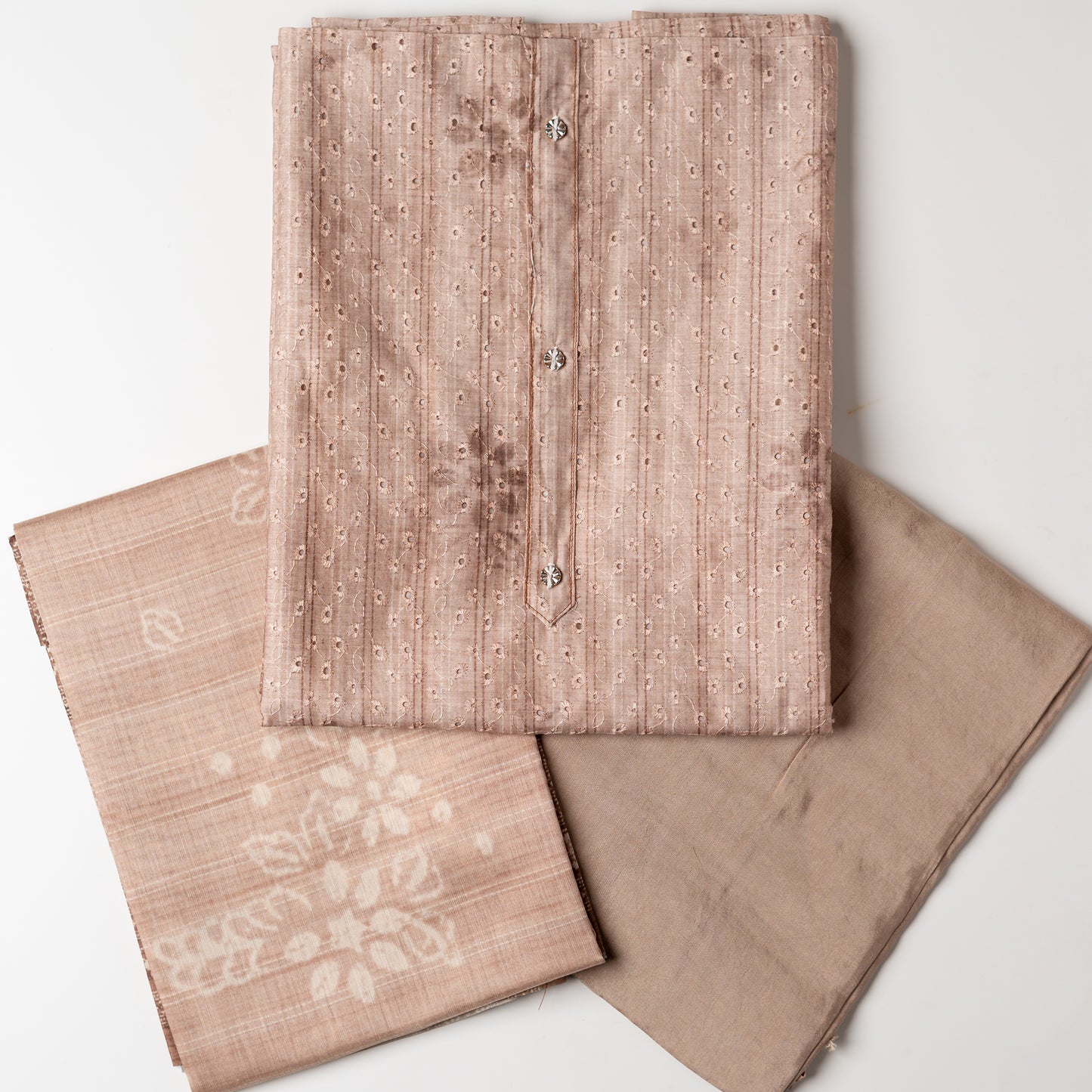 pastel brown color Chanderi silk dress material with hakoba design, it has floral shaded prints on the top and also show buttons in neck area. Beautiful silk dupatta with digital prints, Pastel brown color cotton silk bottom matching the top and bottom