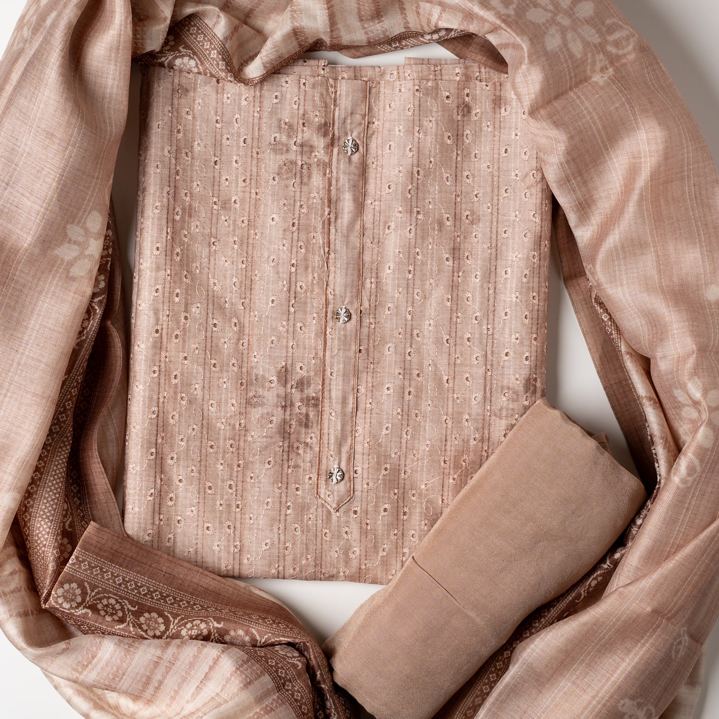 pastel brown color Chanderi silk dress material with hakoba design, it has floral shaded prints on the top and also show buttons in neck area. Beautiful silk dupatta with digital prints, Pastel brown color cotton silk bottom matching the top and bottom