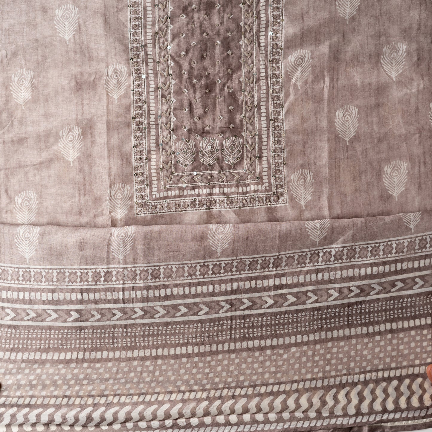 Chanderi silk dress material with thread work and and sequins work, the thread work is done with the same color thread of the top