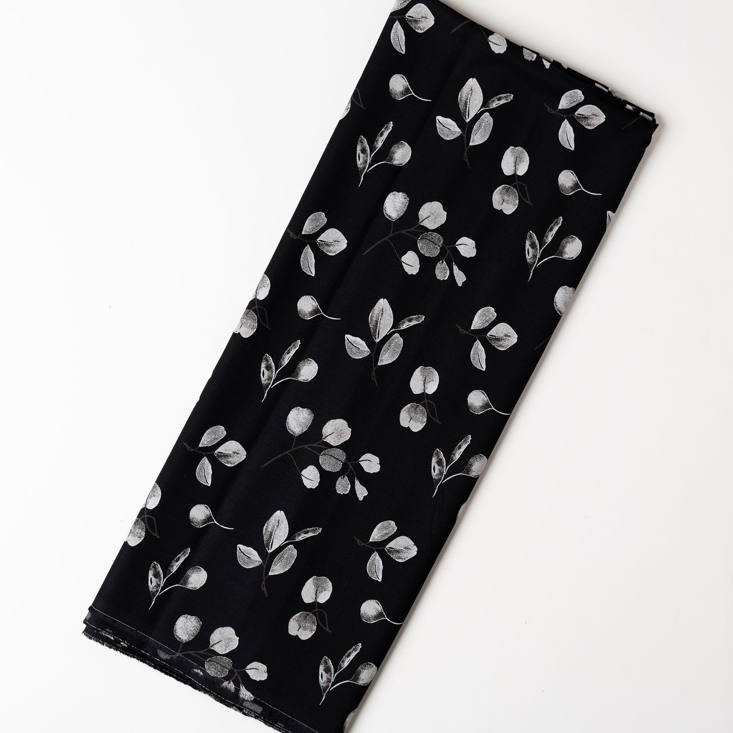 Rayon black color fabric with grey and white color mix prints, suitable for kurti/kurta, tops, or gowns.