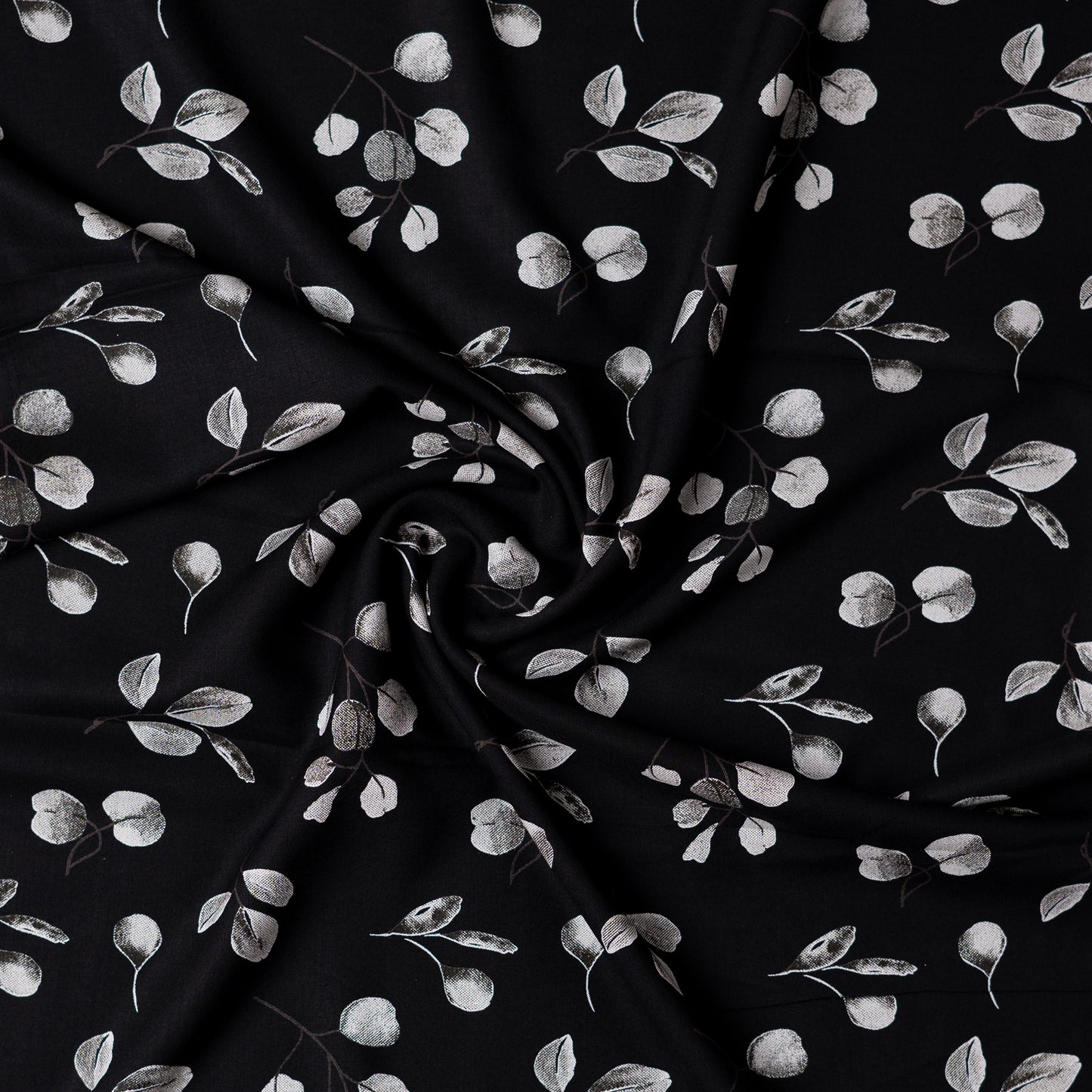 Rayon black color fabric with grey and white color mix prints, suitable for kurti/kurta, tops, or gowns.
