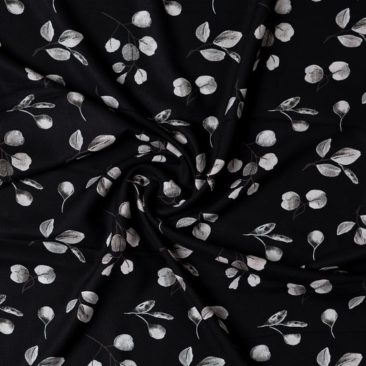 Rayon black color fabric with grey and white color mix prints, suitable for kurti/kurta, tops, or gowns.