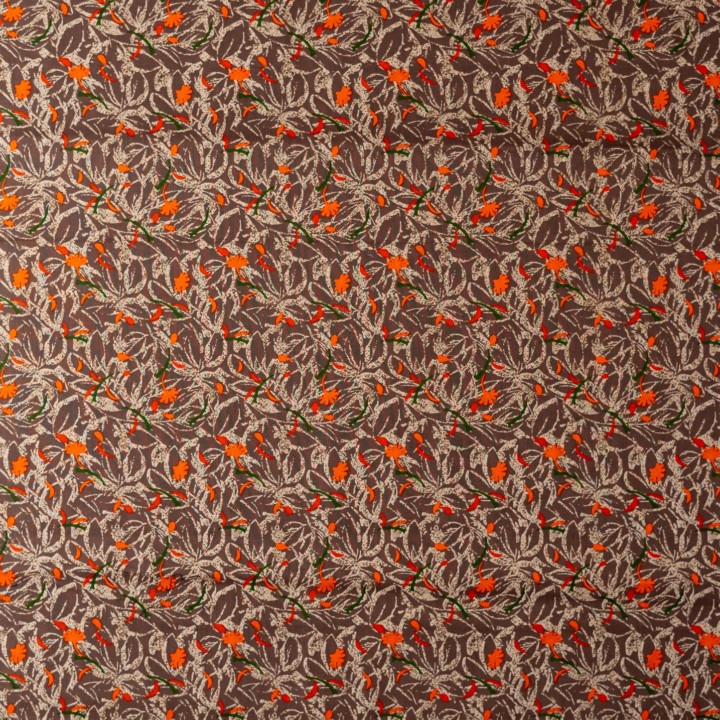 beautiful brown color cotton fabrics with orange, cream and green color prints