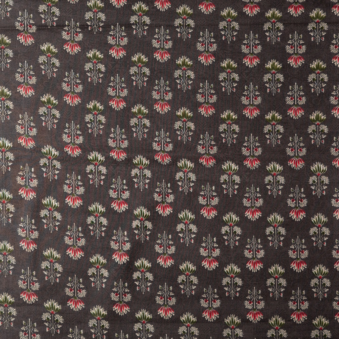 dark brown color printed fabric with maroon, green and cream color beautiful prints