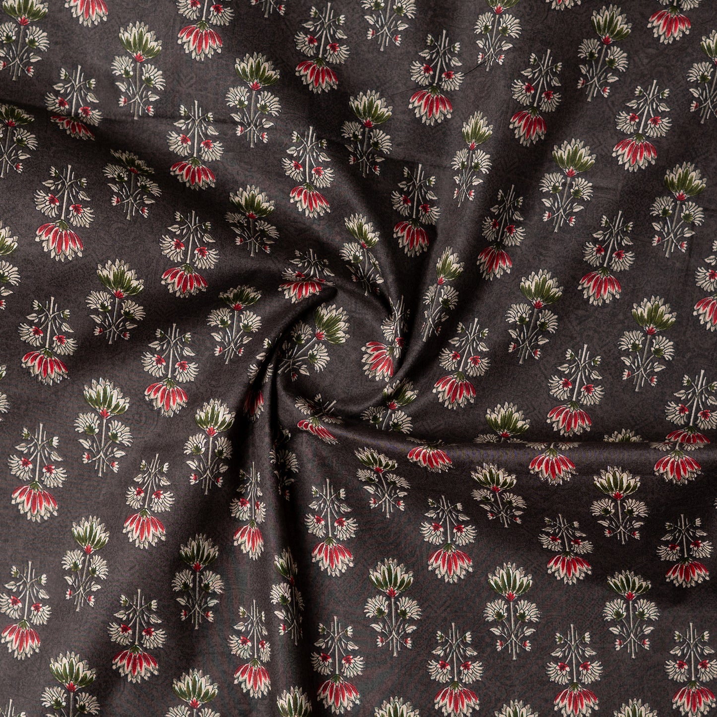 dark brown color printed fabric with maroon, green and cream color beautiful prints