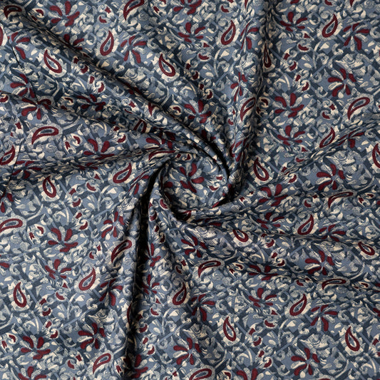 Grey color fabric with dark maroon and cream color prints