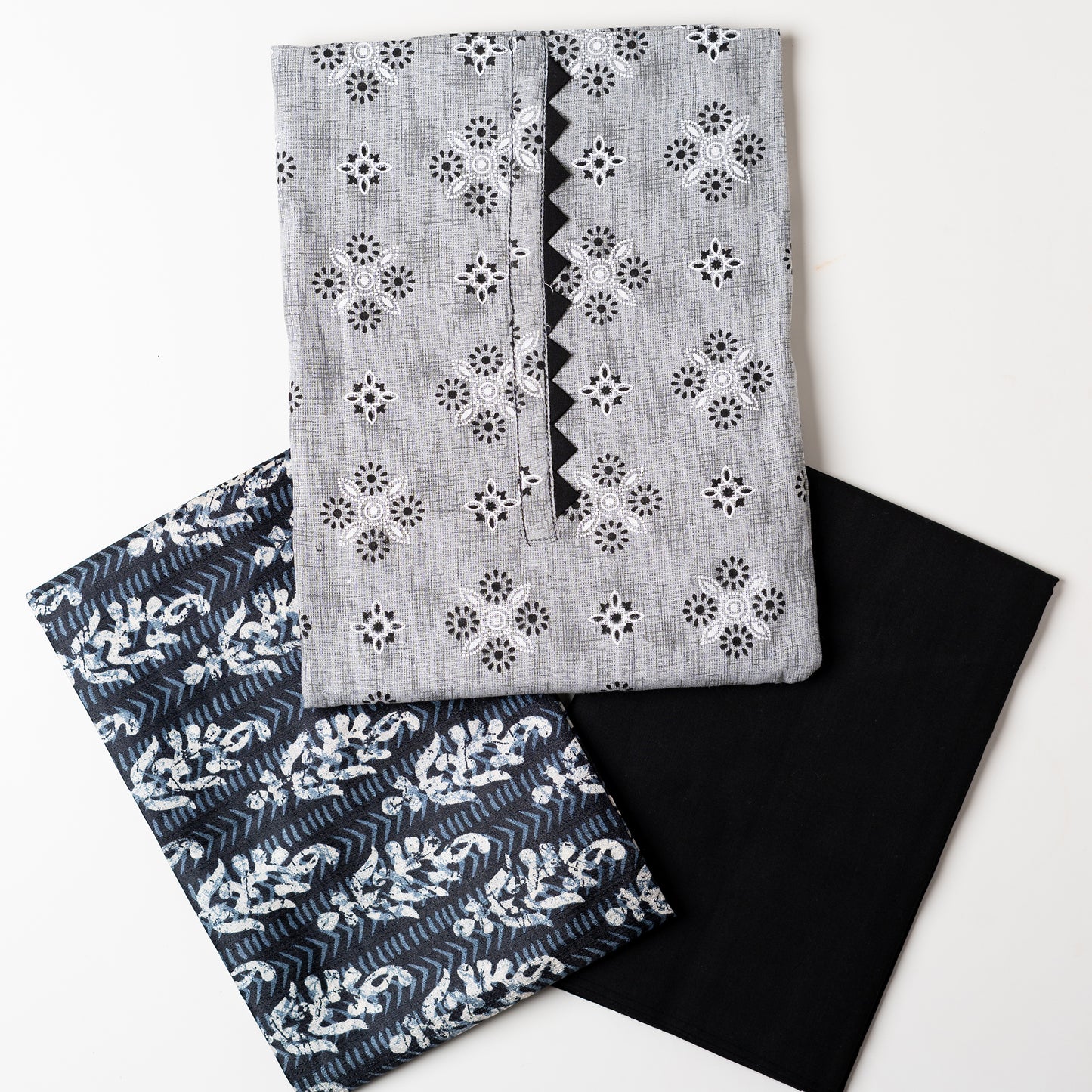 A must buy collection for upcoming summer season, cotton top with print design and pattern in neck line in black color. Chanderi printed dupatta, cotton plain black color bottom