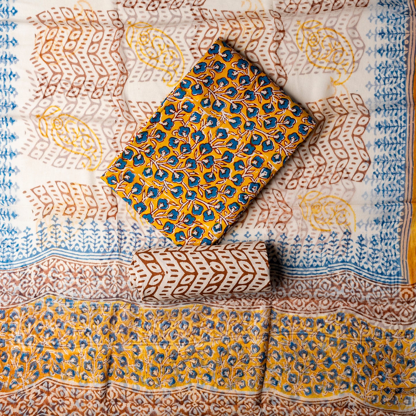 cotton dress material, It's a perfect gift for cotton lovers!!. This is a pure cotton hand block printed set, the fabric is soft and prints are so elegant. Cotton top with multi color prints, cotton bottom with brown color prints. Pure chiffon dupatta with multi color prints.