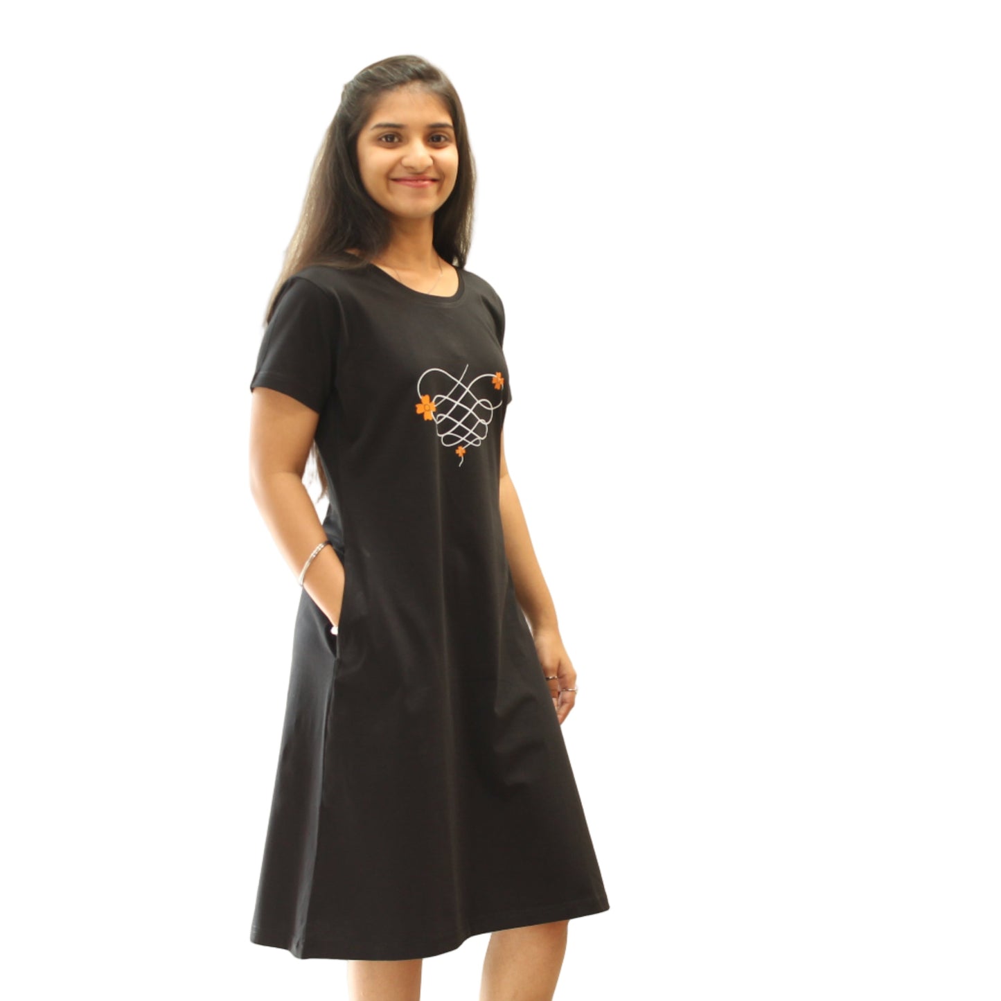 women in black color cotton knee length short nighty with pocket