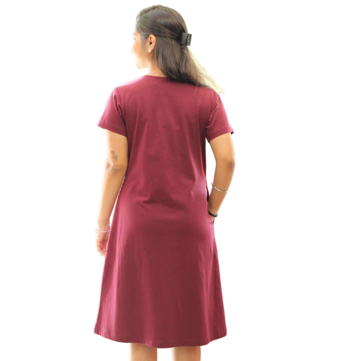 women wearing solid dark wine color short nighty, back side view