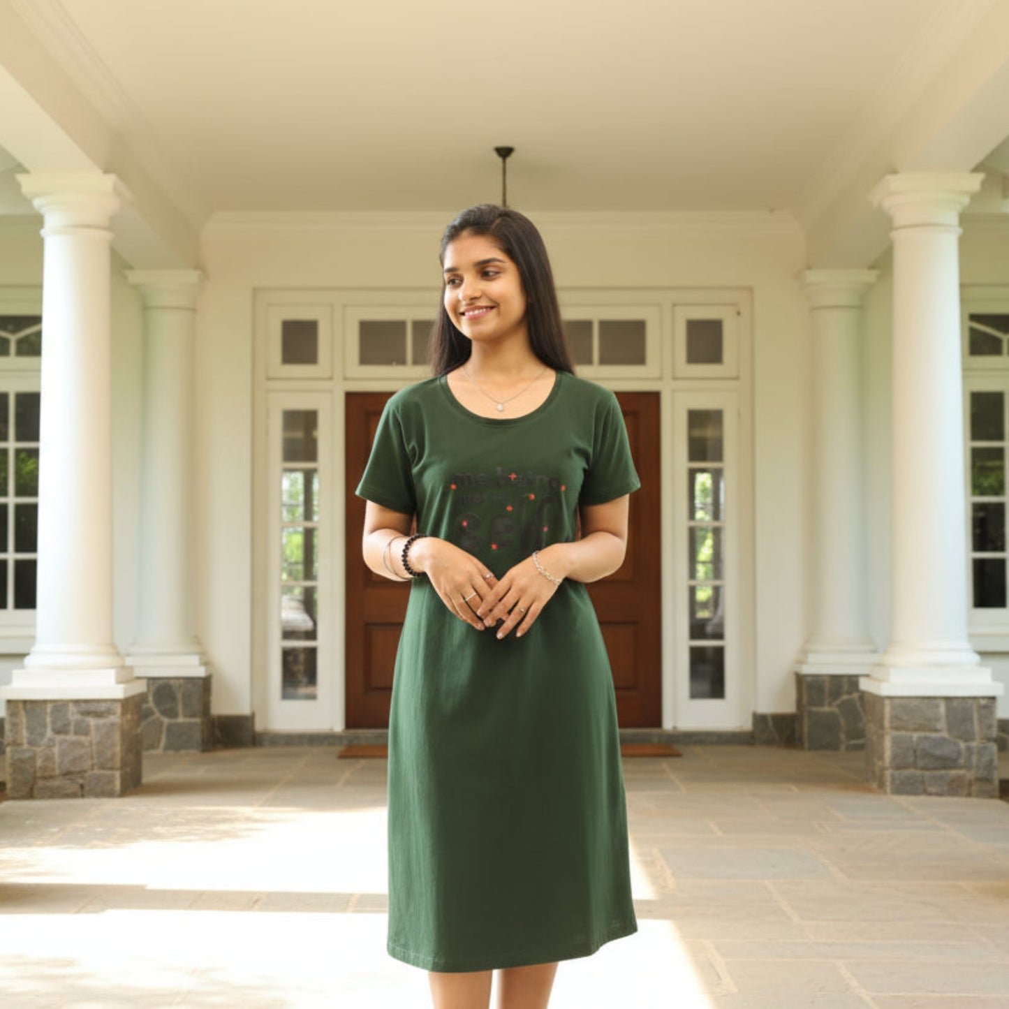women standing in casual pose wearing green color cotton short nighty
