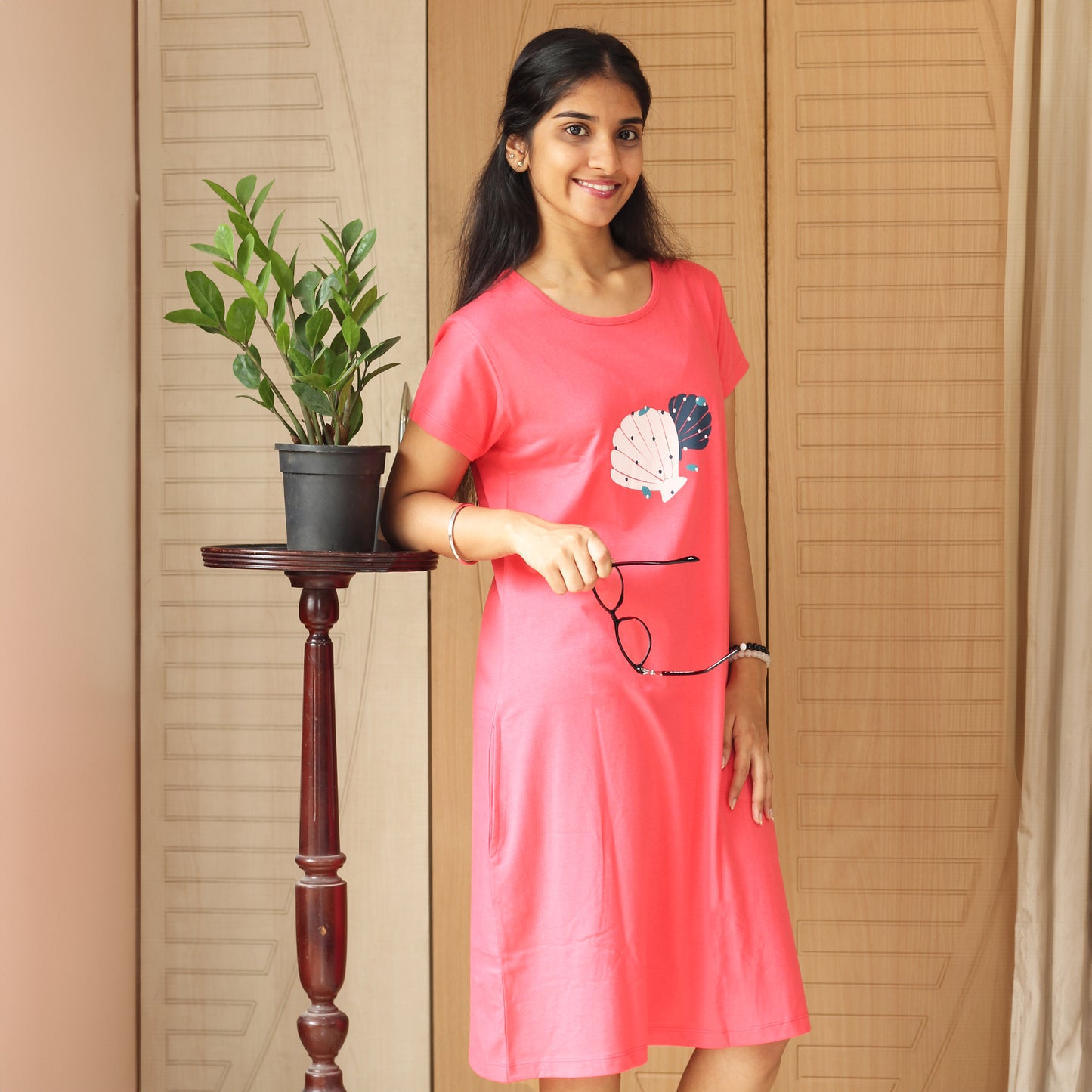 casual pose of knee length short night gown with pocket