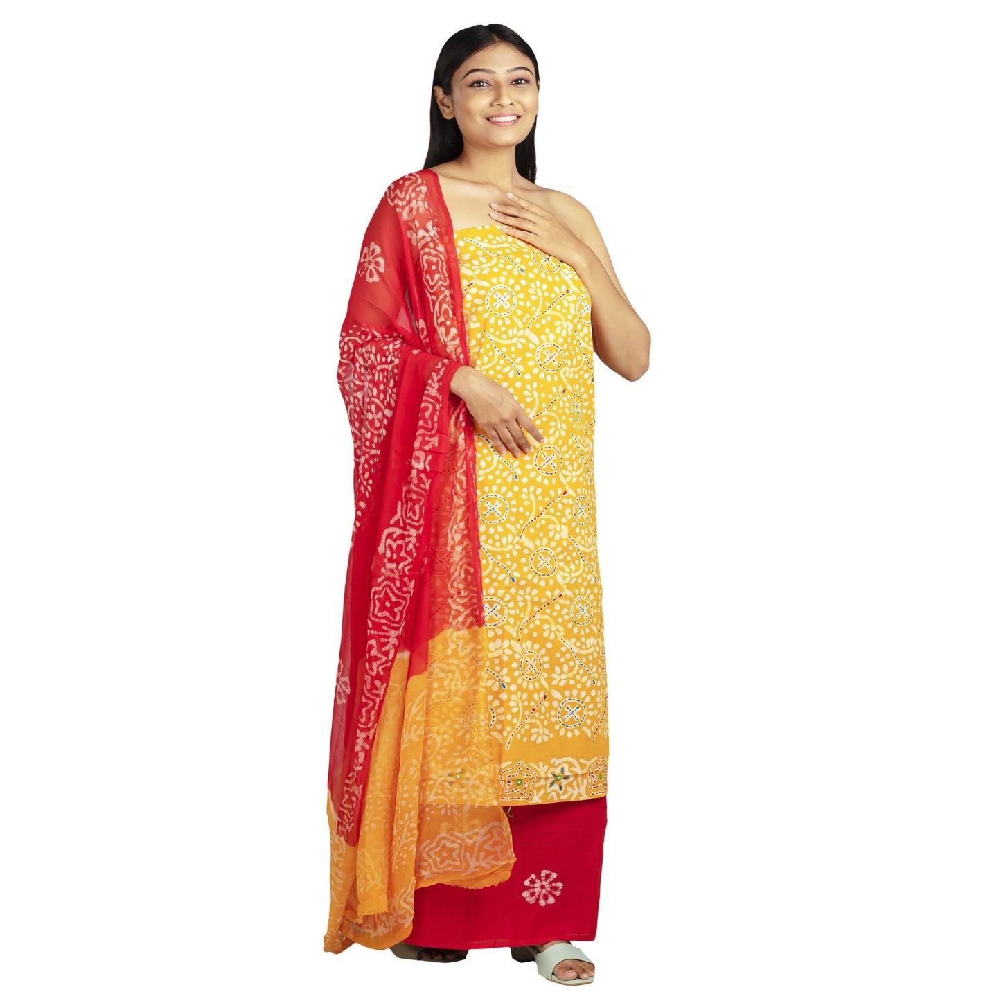 yellow cotton top with embroidery and white print , red bottom with white print, chiffon dupatta in red and yellow