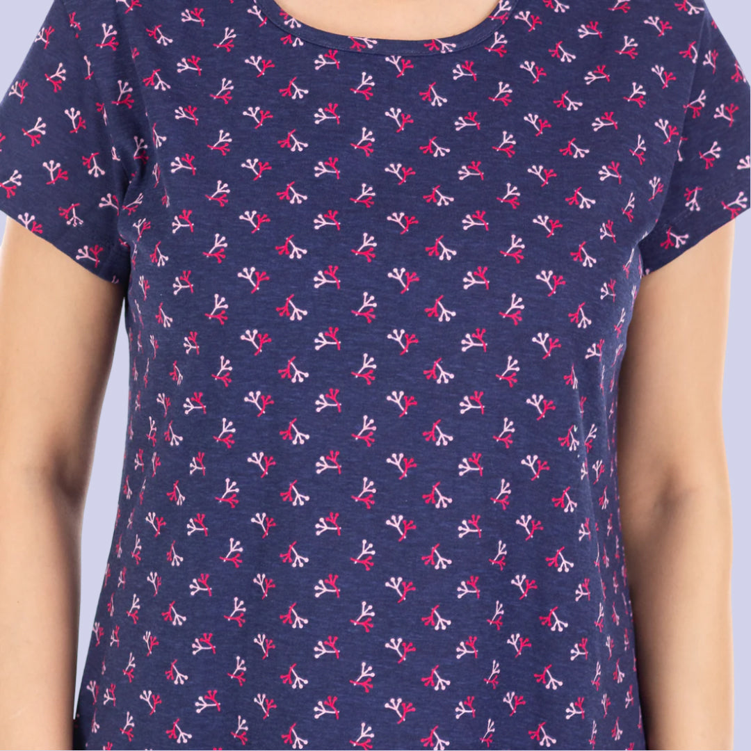 closeup view of the print design in chest area , small design printed in white and maroon color