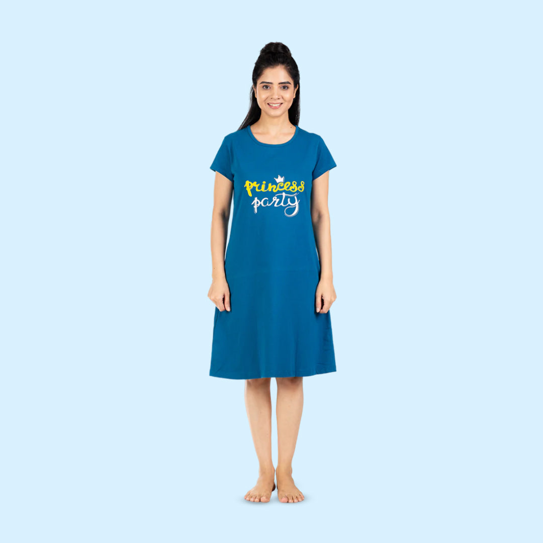 front side view of teal blue color cotton short nighty with princess party written on the chest area in white and yellow color