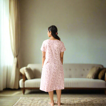 back side view of short nighty for women in light pink color 