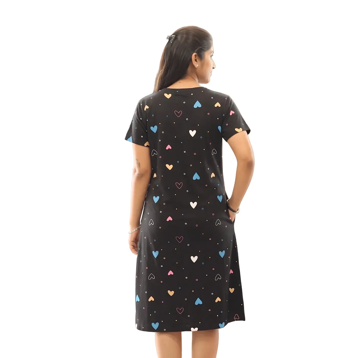 women wearing black color cotton short nighty standing backwards to show the backside view 