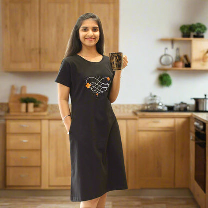 women wearing knee length nighty and posing casually holding a coffee mug