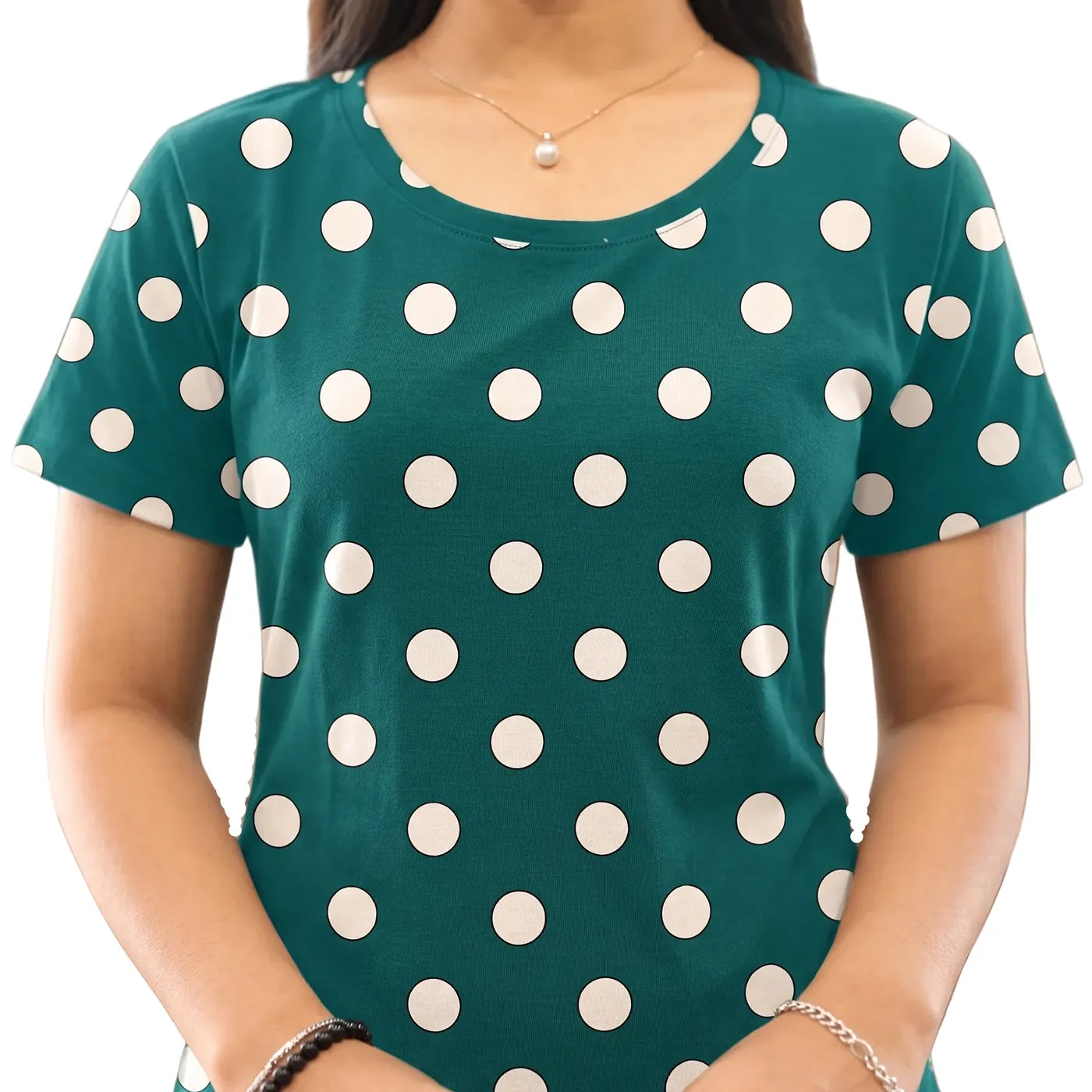 closeup view of green polka dot short nighty 
