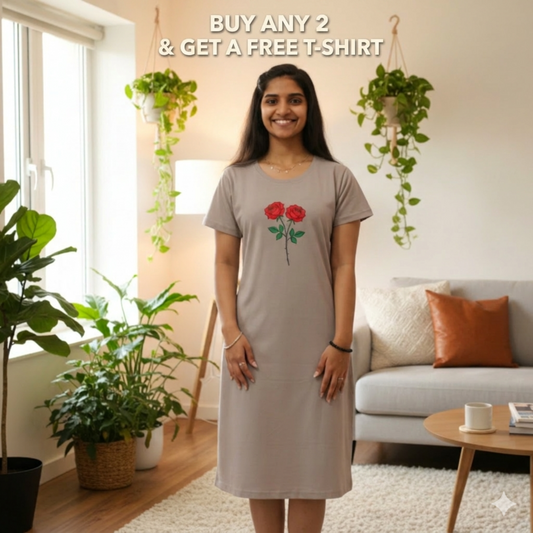 Woman wearing a light grey cotton short nighty with floral design, its knee length and has a pocket> 