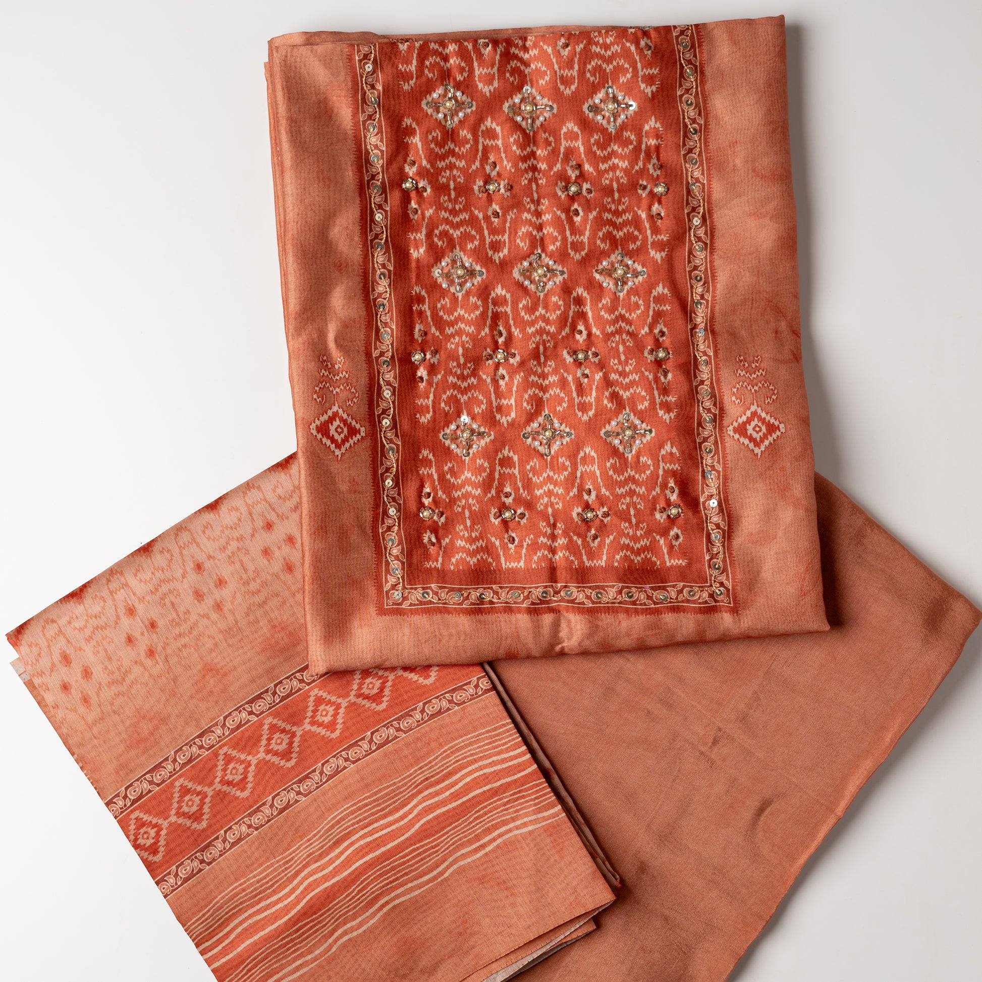 bring dark orange color unstitched salwar suit set for women