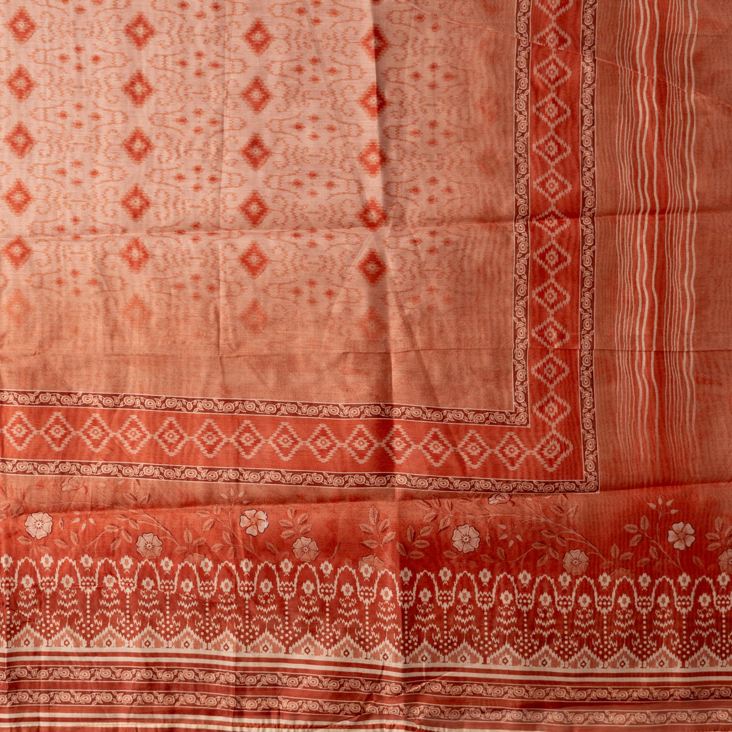 dark orange color silk dupatta with floral prints