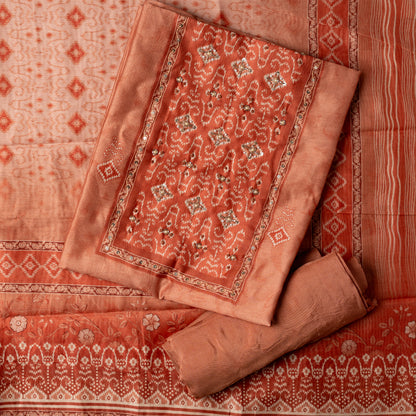 Brick orange color silk dress material with patola prints