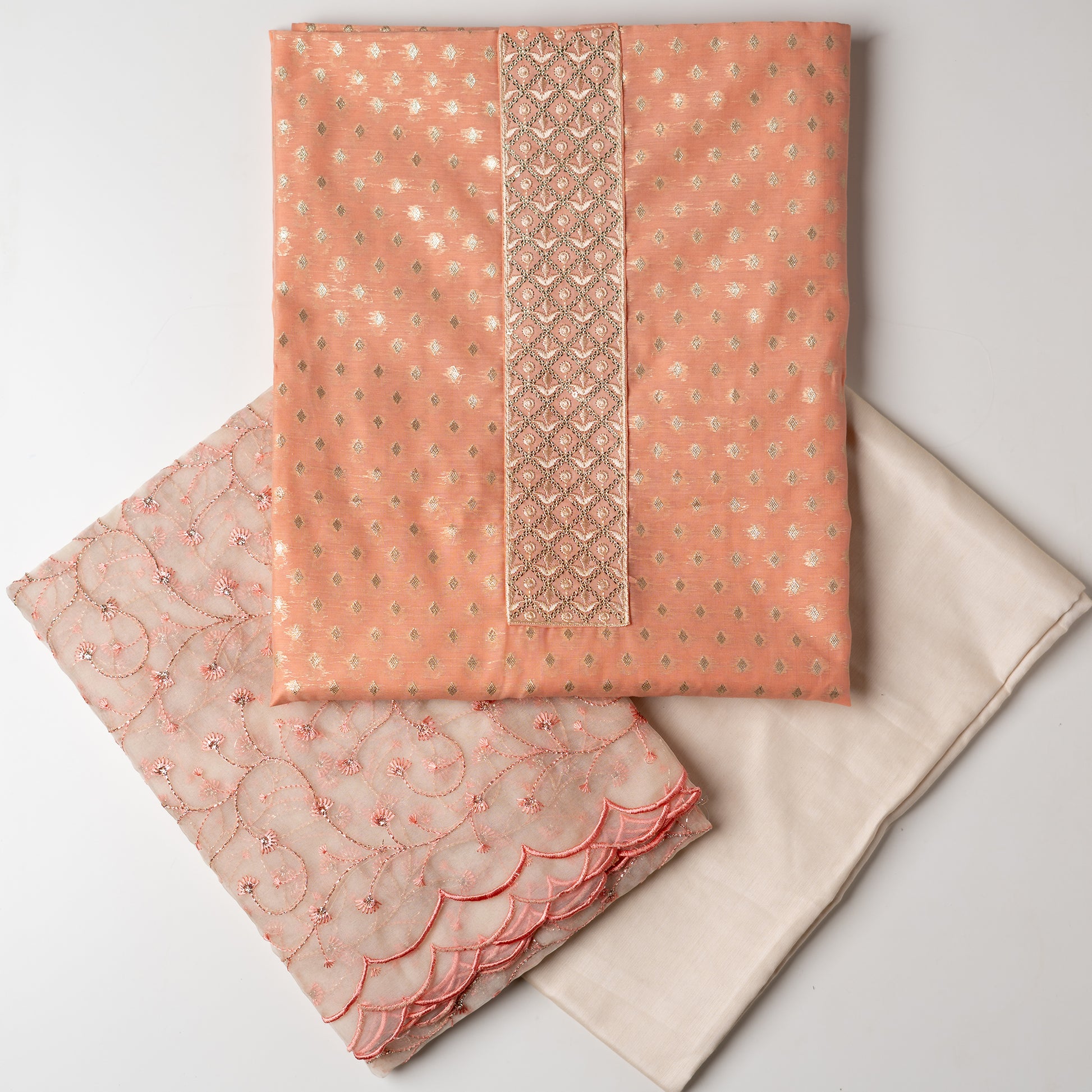 cotton silk cream color bottom along with silk dupatta and peach color top