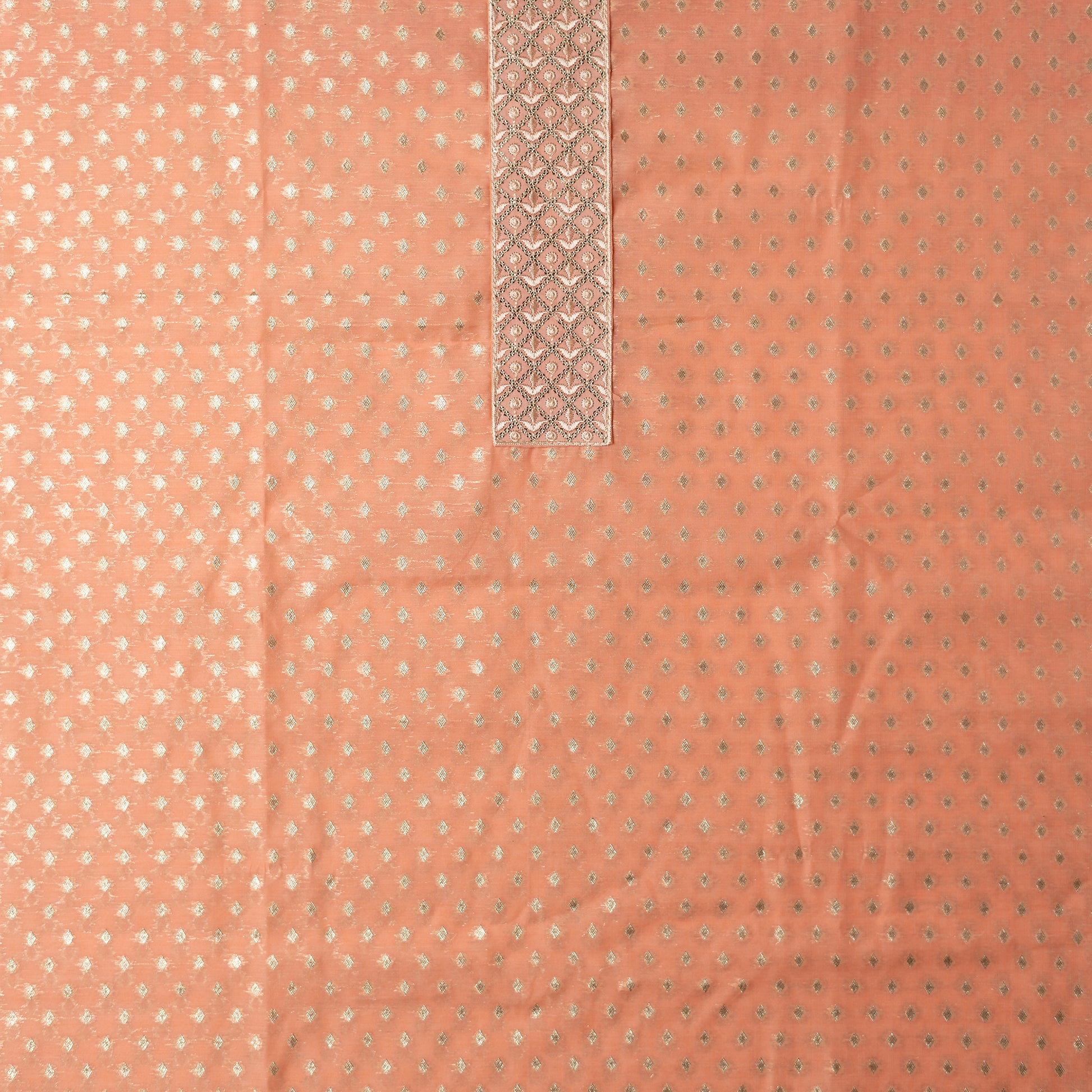 Peach color chanderi silk top with golden butti all over and embroidery on the yoke