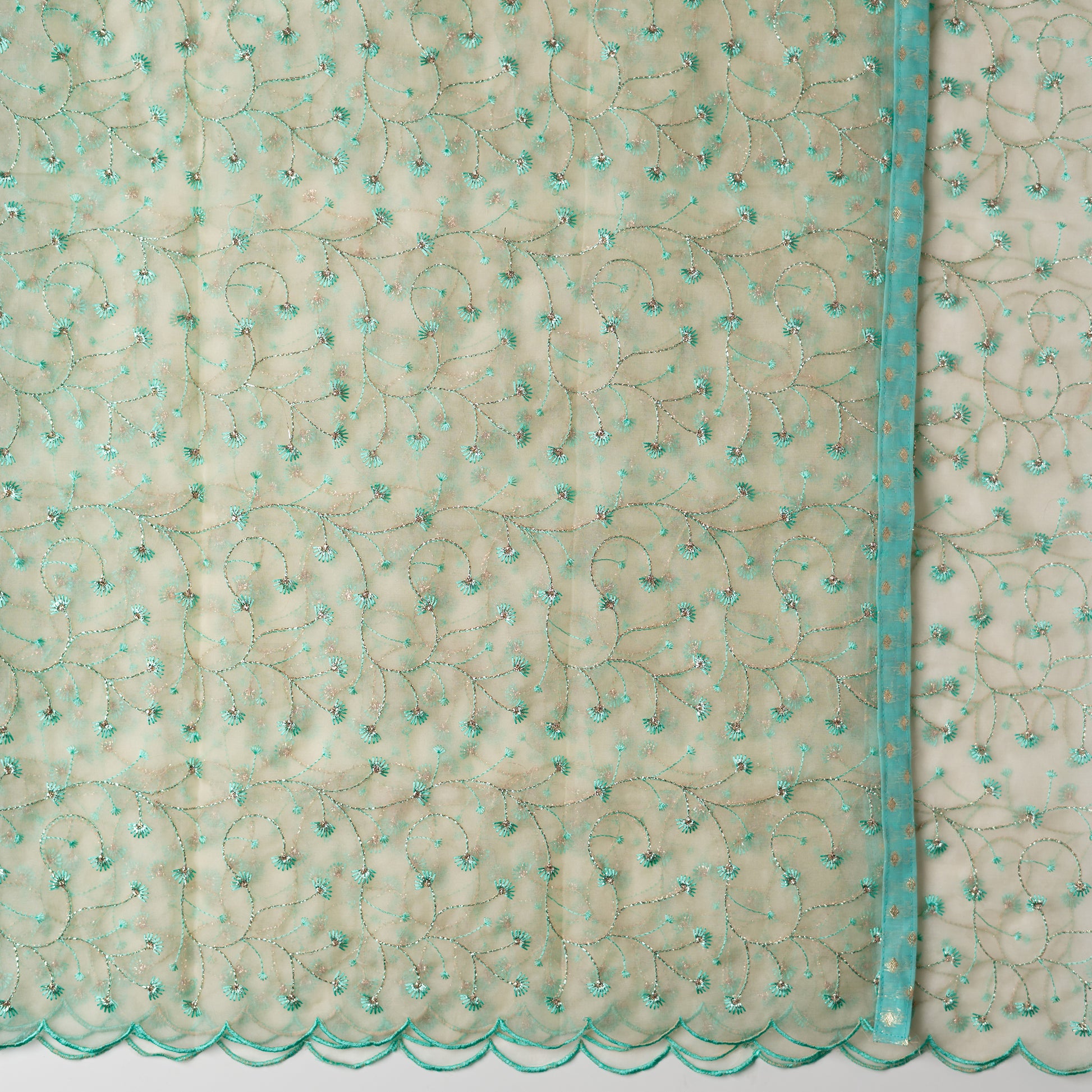 cream color silk dupatta with embroidery all over and cut work on the border