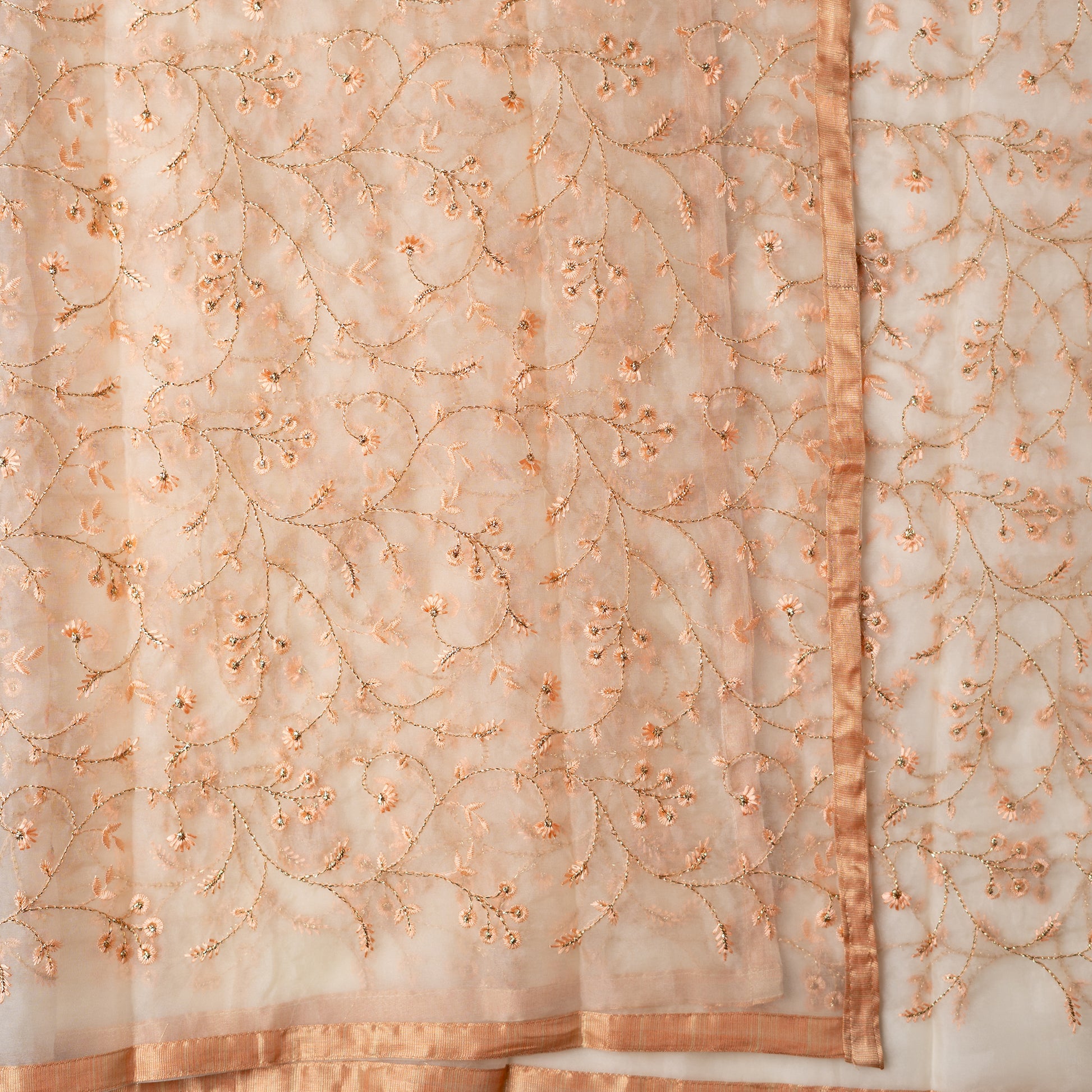 Silk dupatta with embroidery work with the same color thread of top and also golden color threads.