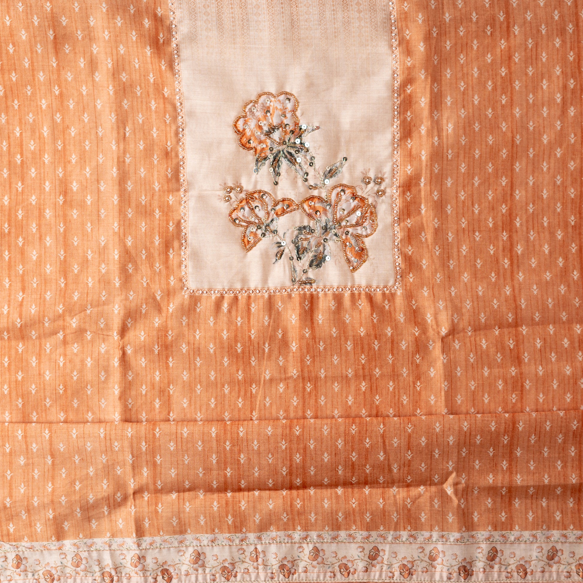 This beautiful chanderi silk unstitched salwar suit is perfect for any occasion, your office wear or party wear. Light orange color chanderi silk top with elegant digital prints all over the body. it has sequins and bead work in neck line area.