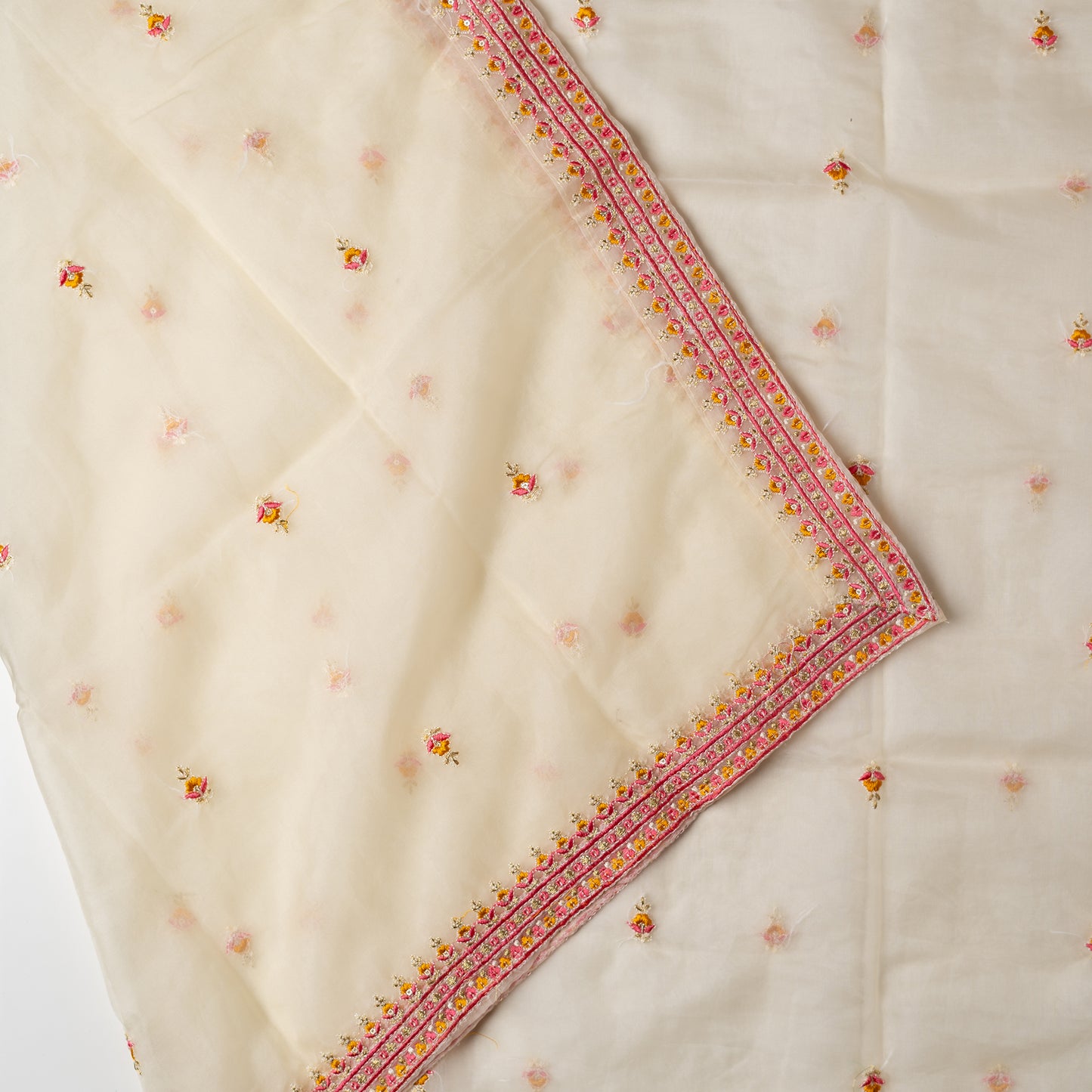 Matching cream color dupatta with embroidery work all over and on the borders.