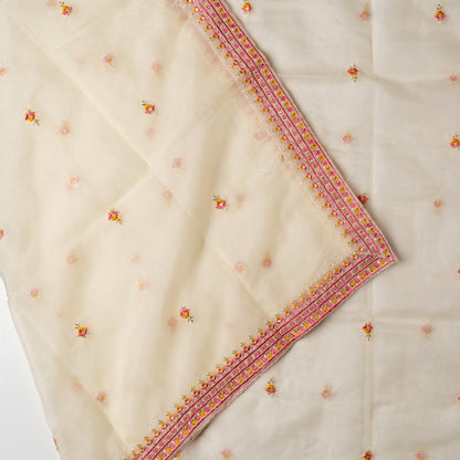 Matching cream color dupatta with embroidery work all over and on the borders.