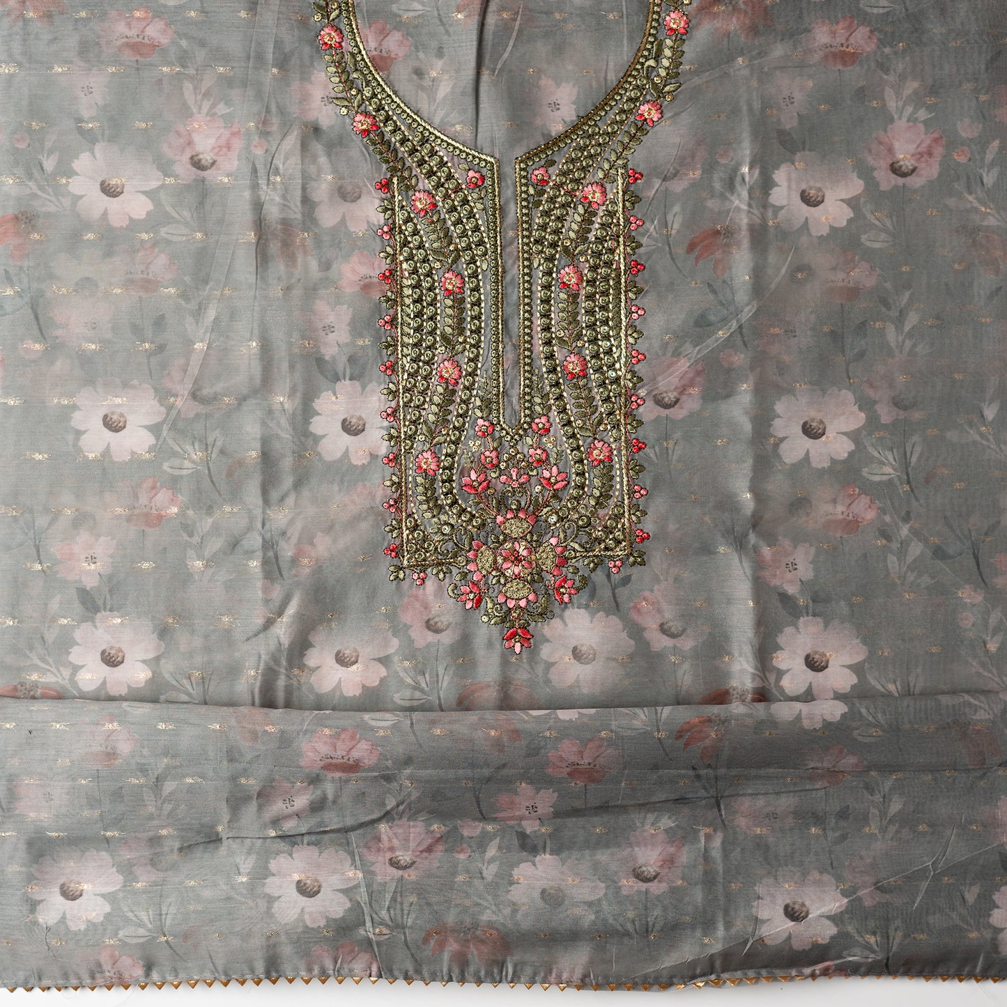 Top fabric, It's just awesome, pick any color of this design and we are sure you will love it the most. Beautiful embroidery work  in the neck. Sober floral prints and jacquard weaving in golden thread is giving the set a royal look.