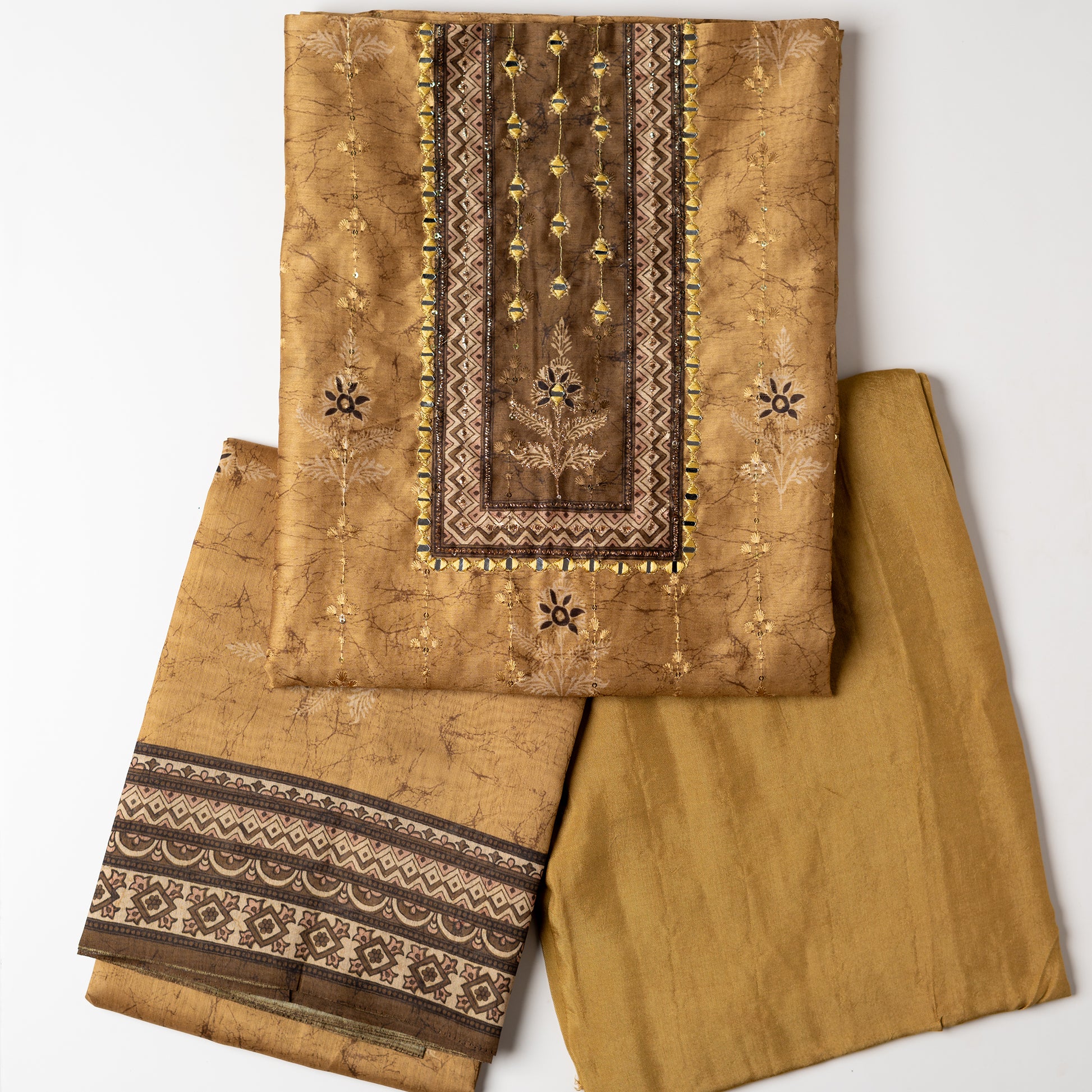 Chanderi silk dress material with print design, embroidery work, thread work and sequins work. It has zari and mirror work in neck area also. Silk dupatta with beautiful digital prints matching the top color. Cotton silk bottom same color as the top and dupatta.