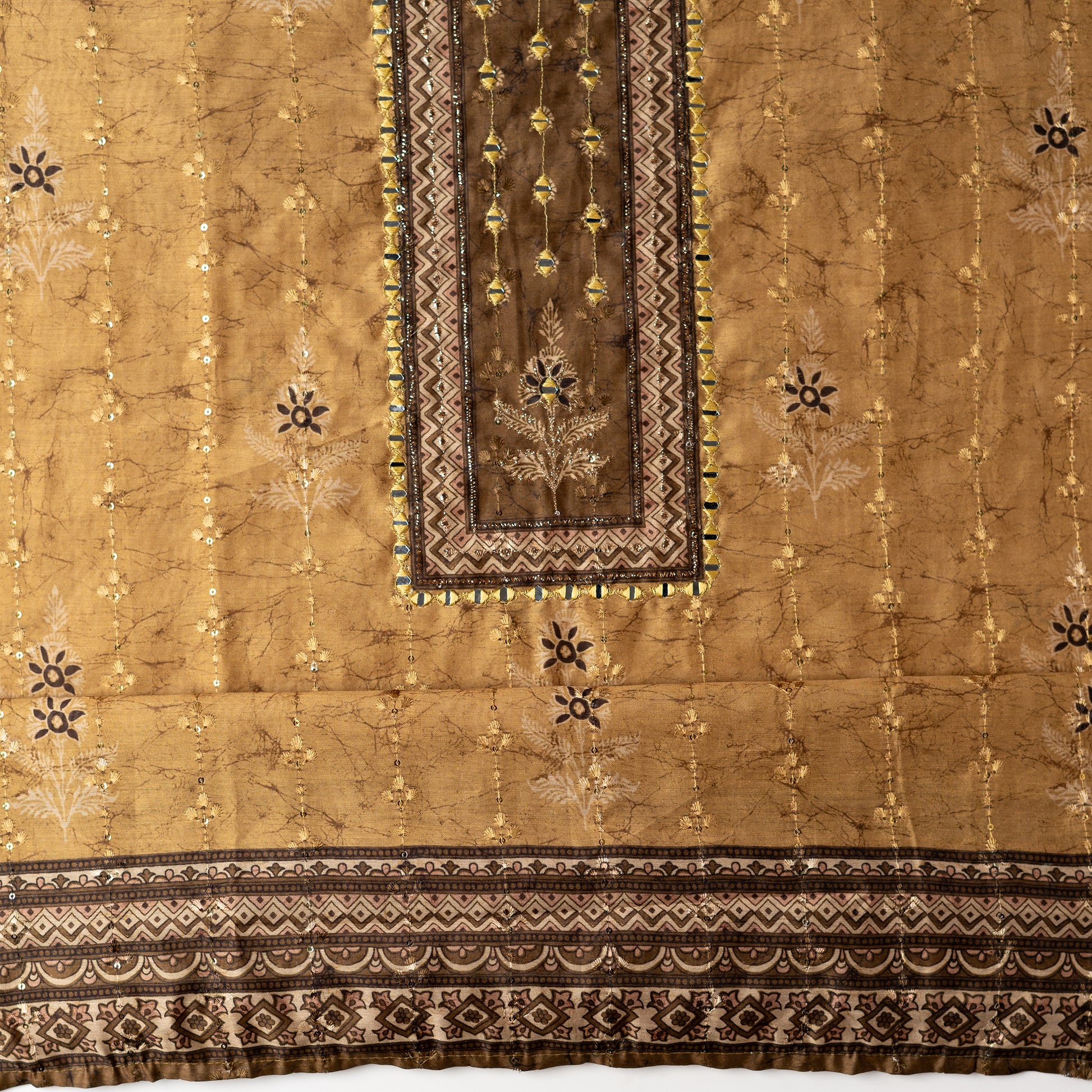 Chanderi silk dress material with print design, embroidery work, thread work and sequins work. It has zari and mirror work in neck area also.