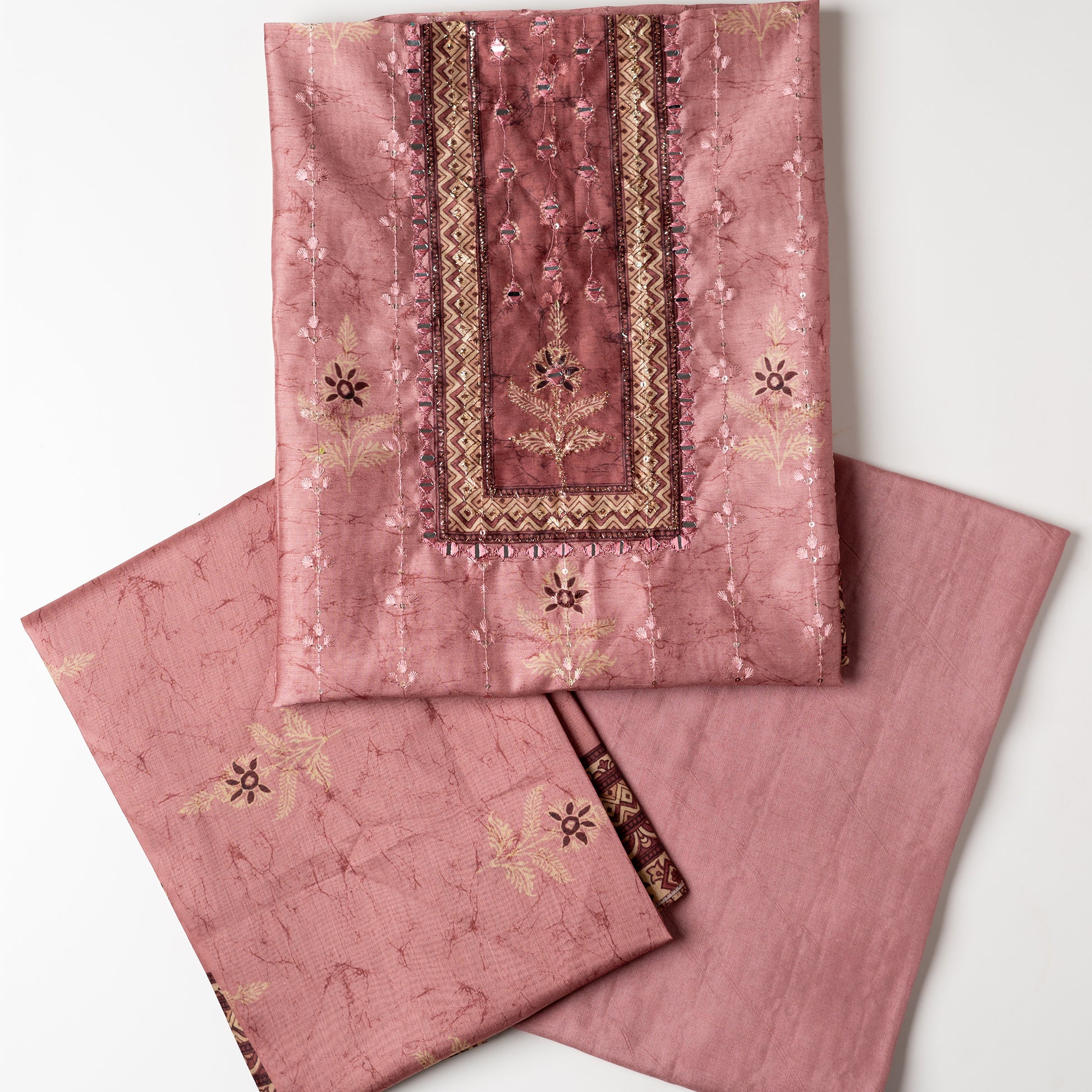 Chanderi silk dress material with print design, embroidery work, thread work and sequins work. It has zari and mirror work in neck area also. Silk dupatta with beautiful digital prints matching the top color. Cotton silk bottom same Light Wine color as the top and dupatta.