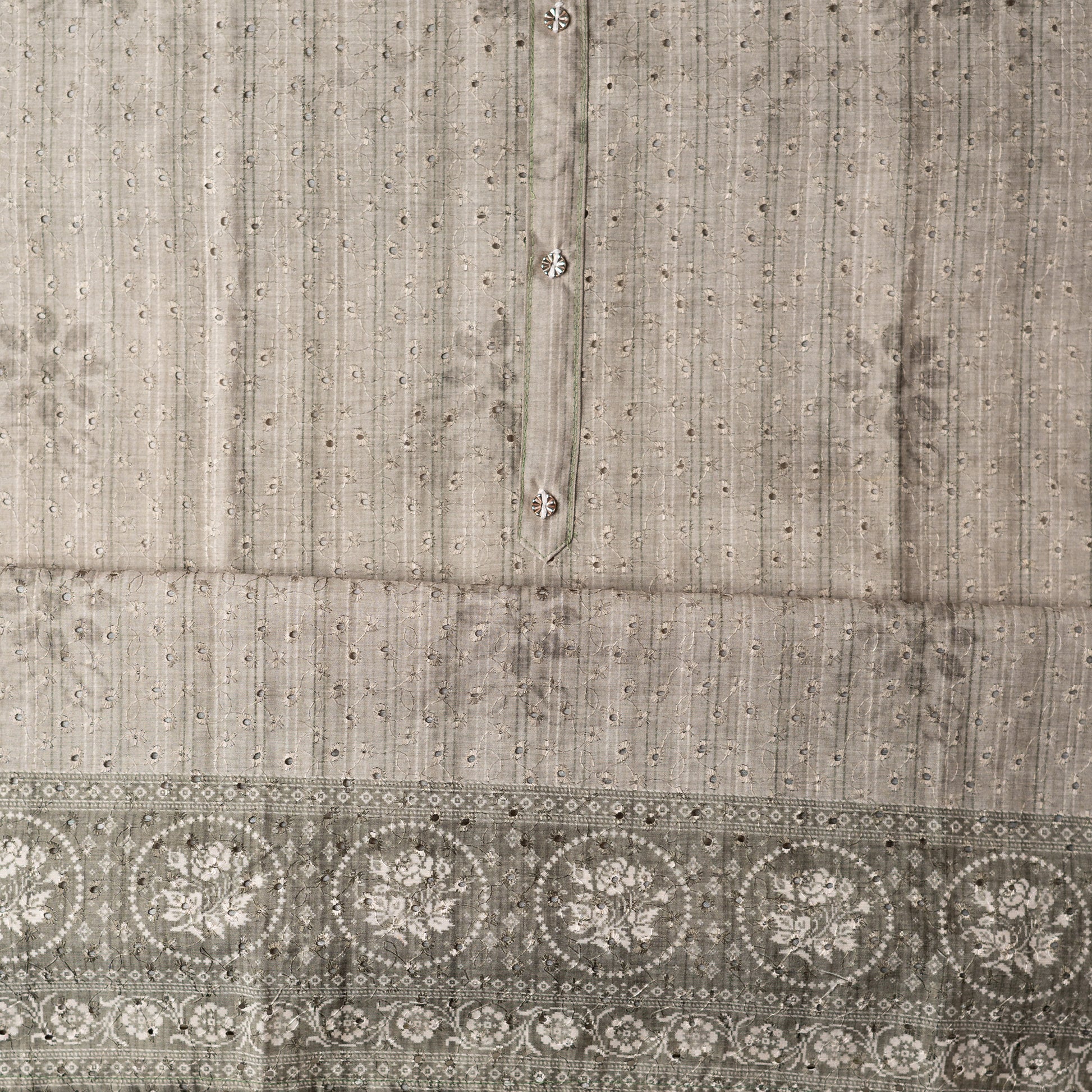 Chanderi silk dress material with hakoba design, it has floral shaded prints on the top and also show buttons in neck area.