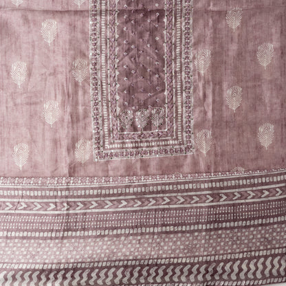 light purple color Chanderi silk dress material with thread work and and sequins work, the thread work is done with the same color thread of the top. 