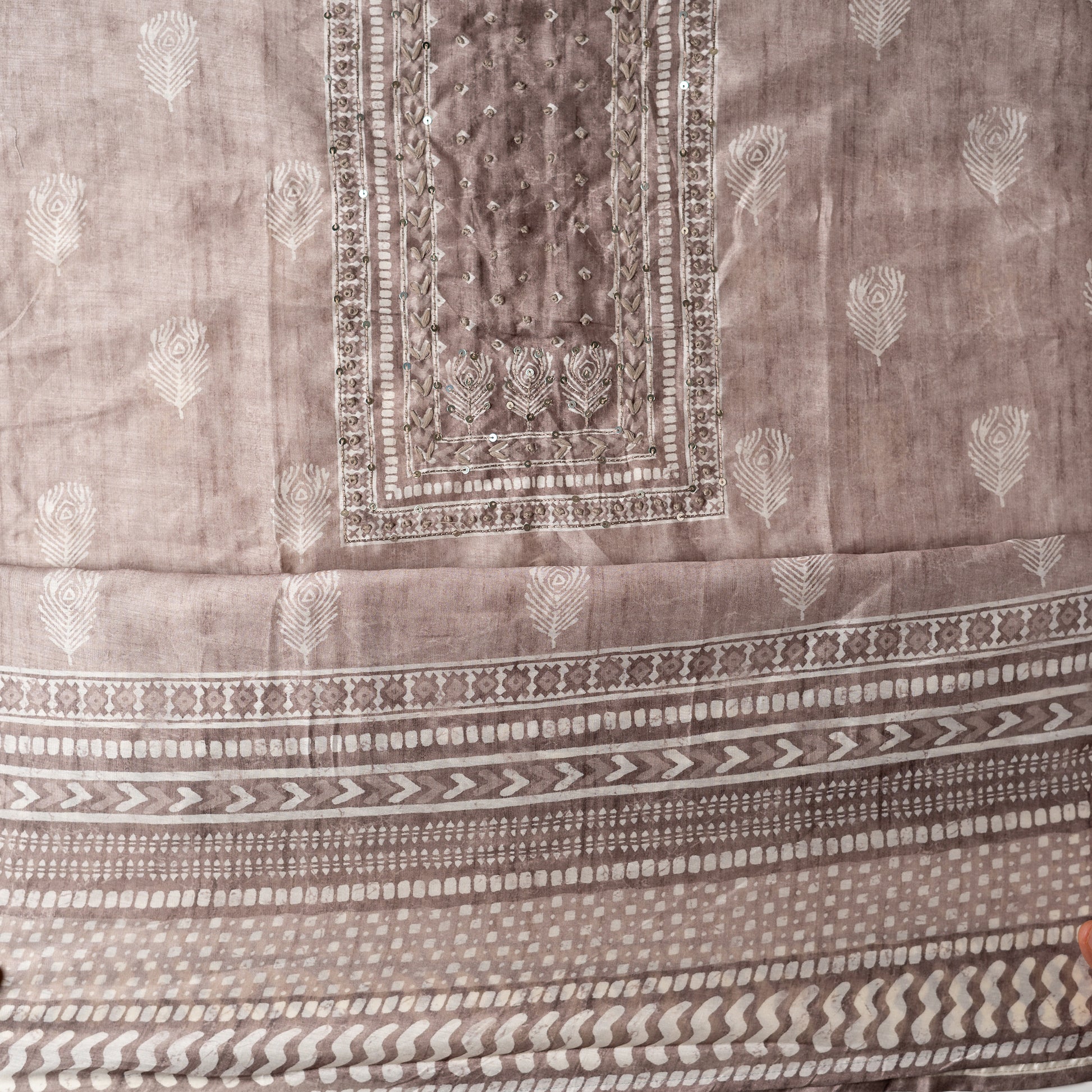 Chanderi silk dress material with thread work and and sequins work, the thread work is done with the same color thread of the top